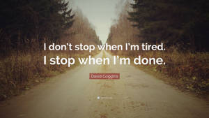 David Goggins Quote On Empty Road Wallpaper