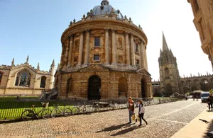 Dawn At Oxford University With Radcliffe Camera In View Wallpaper