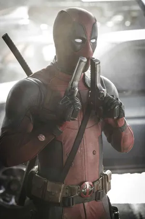 Deadpool Movie Sniffing Guns Poster Wallpaper