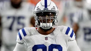 Deforest Buckner White Helmet And Football Jersey Wallpaper