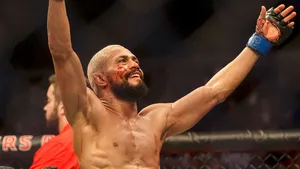 Deiveson Figueiredo Smiling With Bloody Cheek Wallpaper