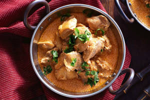 Delectable Butter Chicken Cuisine At Its Finest. Wallpaper