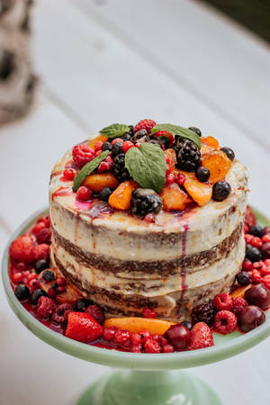 Delicious Fruits And Cream Cake Wallpaper