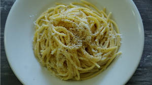 Delighting In A Plate Full Of Exquisite Cacio E Pepe Wallpaper