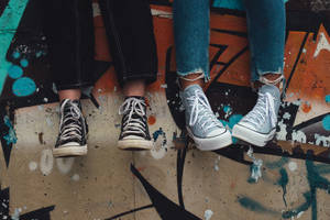 Denim And Black Converse Sneakers Wallpaper