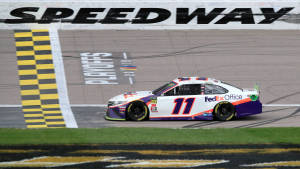 Denny Hamlin Near The Finish Line Wallpaper