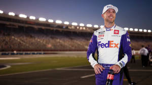 Denny Hamlin Wearing Fedex Cap And Suit Wallpaper