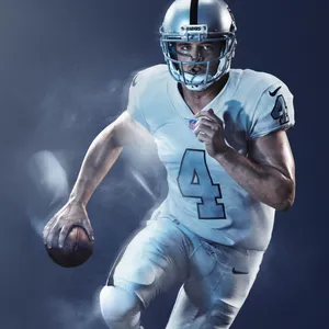 Derek Carr Charging With The Ball Wallpaper