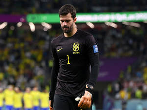 Determined Alisson Becker Steeled For Battle Wallpaper
