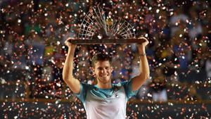 Diego Schwartzman Holding Trophy Wallpaper