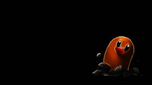 Diglett Of Pokémon On Black Background Wallpaper
