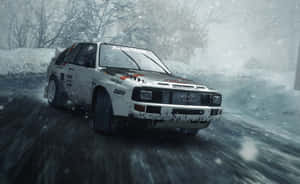 Dirt Rally Game Car On Snowy Winter Road Wallpaper
