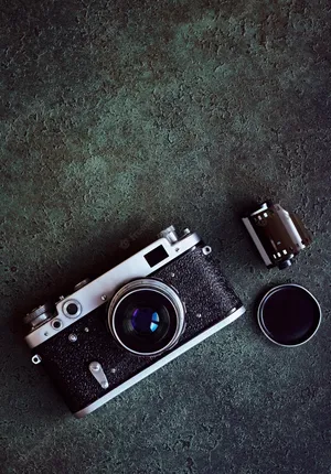 Disassembled Photography Camera Top View Wallpaper