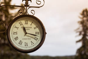 Discovering London's Clock Tower At Paddington Station Wallpaper