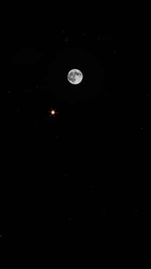 Dive Into A Star-studded Evening With Moon Iphone Wallpaper
