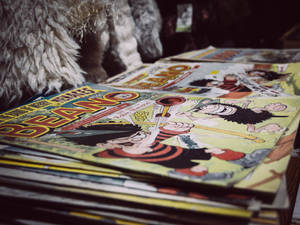 Dive Into Nostalgia With A Pile Of 90s Vintage Comics Wallpaper