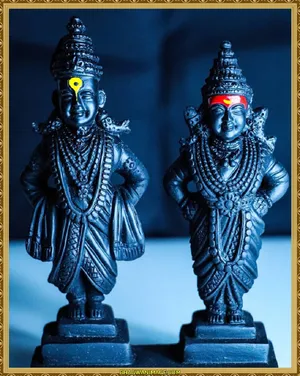 Divine Depiction Of Lord Pandurang And Rukmini On Tabletop Wallpaper