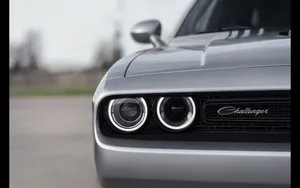 Dodge Challenger Wordmark Logo On A Vibrant Background. Wallpaper