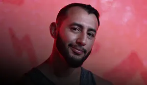 Dominick Reyes Portrait Red Background Wallpaper