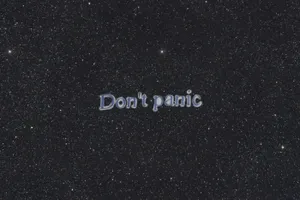 Don’t Panic Starry Background Wallpaper