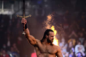 Drew Mcintyre Wwe Scottish Warrior Sword Wallpaper