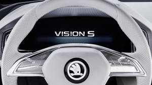 Drive In Style With The Skoda Vision S Logo Wallpaper