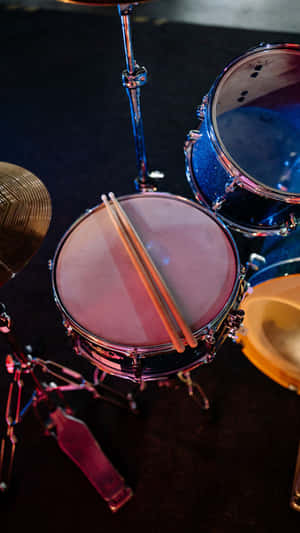 Drumset_ Closeup_with_ Sticks Wallpaper