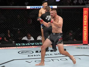 Dustin Jacoby Cheering Fist Pump Wallpaper