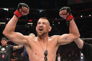 Dustin Jacoby Cheering Flexing Arms Wallpaper