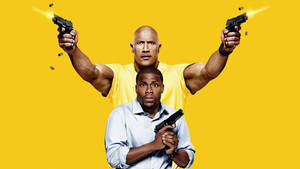 Dwayne Johnson Showing His Determination In A Scene From 'central Intelligence'. Wallpaper