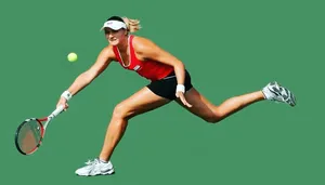 Dynamic Nadia Petrova Leaping For A Tennis Ball Wallpaper