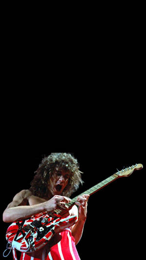 Eddie Van Halen Strumming Portrait Wallpaper