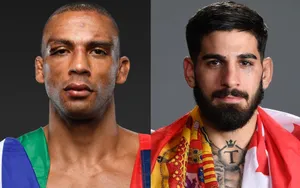 Edson Barboza Landing A Strike On His Opponent In A Mixed Martial Arts Bout. Wallpaper