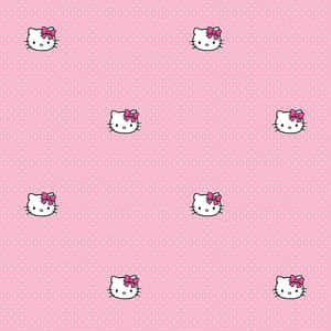 Eight Cute Pink Hello Kitty Heads Wallpaper