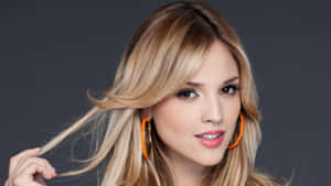 Eiza Gonzalez Portraitwith Orange Earrings Wallpaper