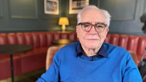 Elderly Manin Blue Sweater Portrait Wallpaper