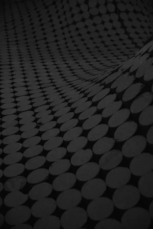 Elegant Black Ipad On A Dark Surface Wallpaper