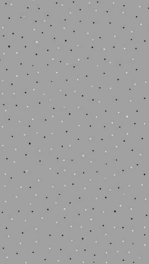 Elegant Grey Iphone With Sleek Polka Dot Pattern Wallpaper