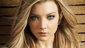 Elegant Natalie Dormer In A Casual Yet Stylish Pose Wallpaper