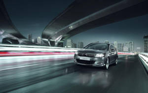 Elegant Silver Citroen Sedan C4 In Stellar Quality Wallpaper