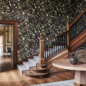 Elegant Staircasewith Floral Wallpaper Wallpaper