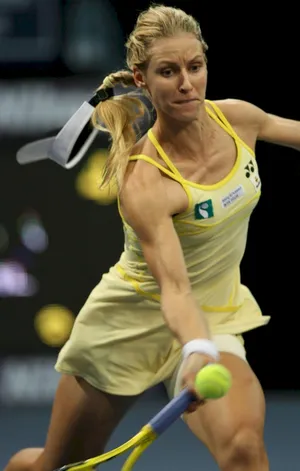 Elena Dementieva Smashing Tennis Ball Wallpaper