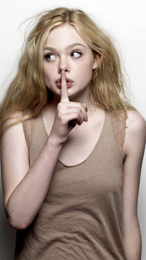 Elle Fanning Glows With Charm, Making Hush Sign Wallpaper
