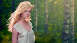 Elle Fanning In The Woods Wallpaper