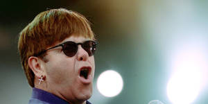 Elton John Concert Focus Portrait Wallpaper