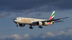 Emirates Airliner In Mid-flight As Featured On Google Flights Wallpaper