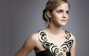Emma Watson Radiates Charm In Her Stylish Outfit. Wallpaper