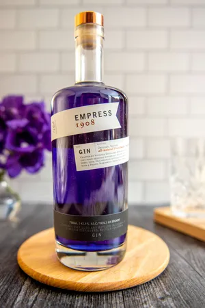Empress Gin On Wooden Dish Plate Wallpaper