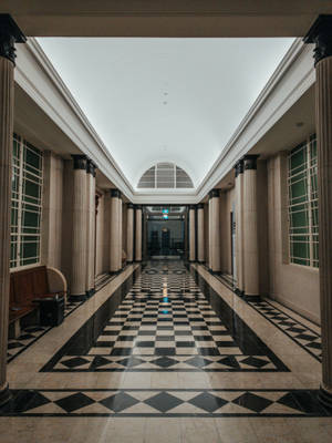 Empty Hallway With Checkered Floor Wallpaper