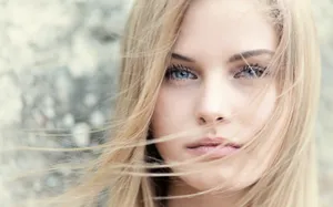 Enchanting Blonde Woman Face Wallpaper